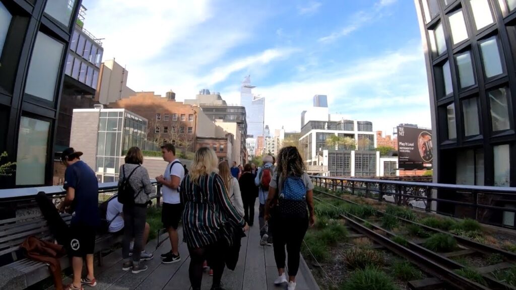 People strolling the High Line park in spring